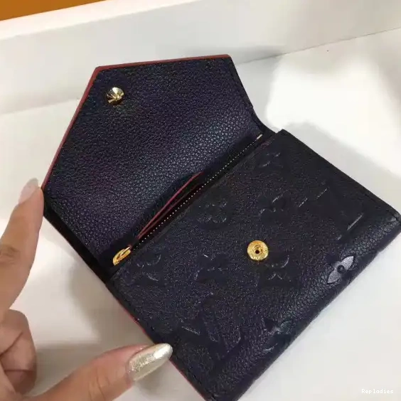 Repladies offers premium fake Louis bags at unbeatable prices. Our products are cheap because we focus on direct sales Louis Victorine wallet Vuitton 0404
